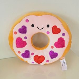 Donut pillow stuffed toy.